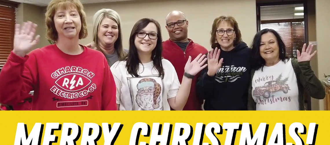 merry christmas with cimarron employees waving